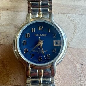 Sharp ladies two-toned blue dial dress watch NEW BATTERY
